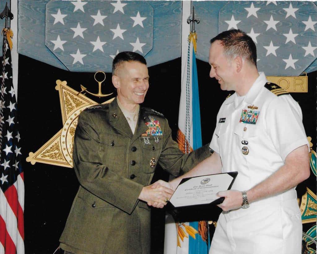 Chairman of the Joint Chiefs, General Pete Pace, recognizes Dr. Parker for his work at the Pentagon.