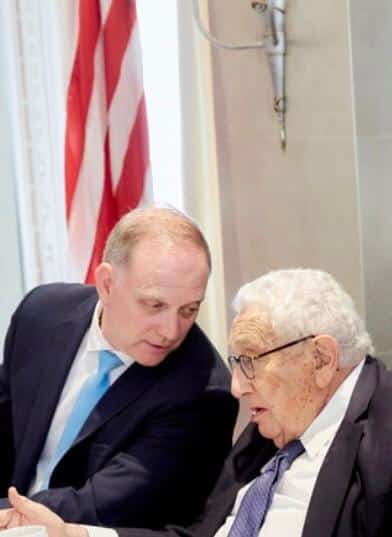 Dr. Henry Kissinger and Dr. Parker discuss national security issues in New York.