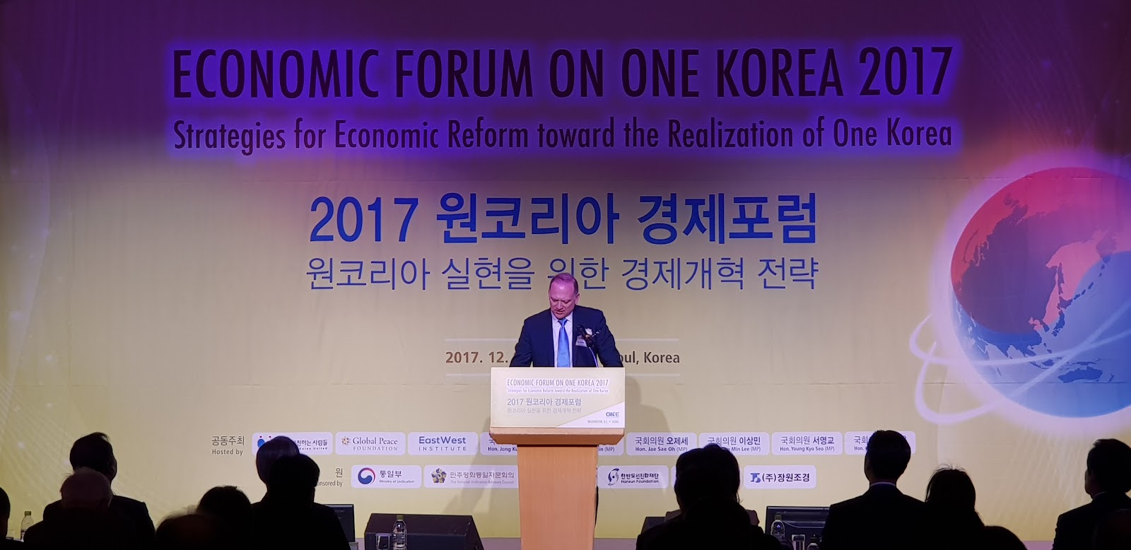 Dr. Parker addressees the economic forum in Seoul, Korea.